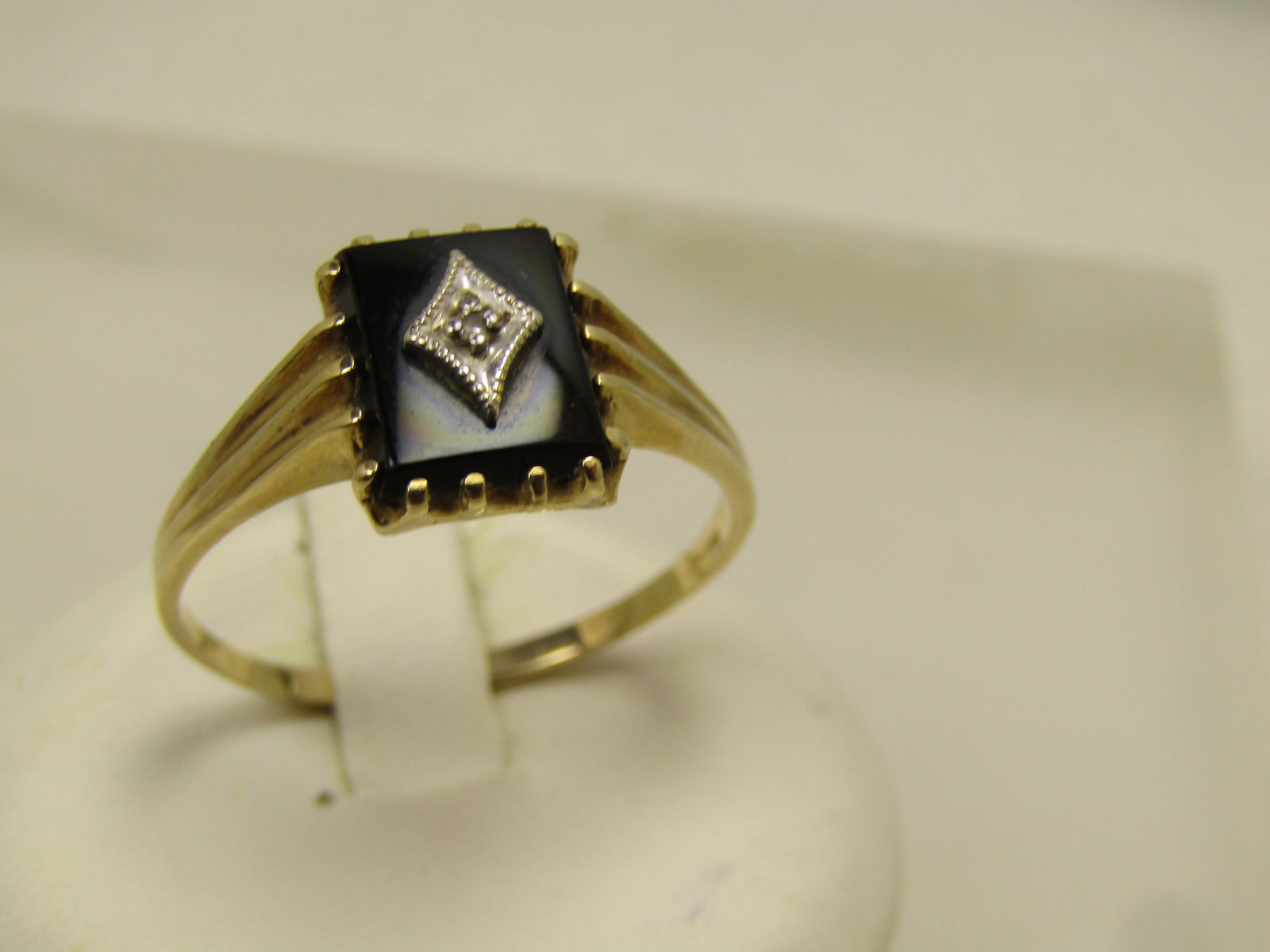 Vintage 10kt Onyx & Diamond Ring, Sz. 12, 1960-1970's, Signed: Title:Vintage 10kt Onyx & Diamond Ring, Sz. 12, 1960-1970's, SignedDescription:Vintage 10kt Onyx & Diamond Ring, Sz. 12, 1960's-1970's, Signed with an unknown maker's mark. It looks like two C's
