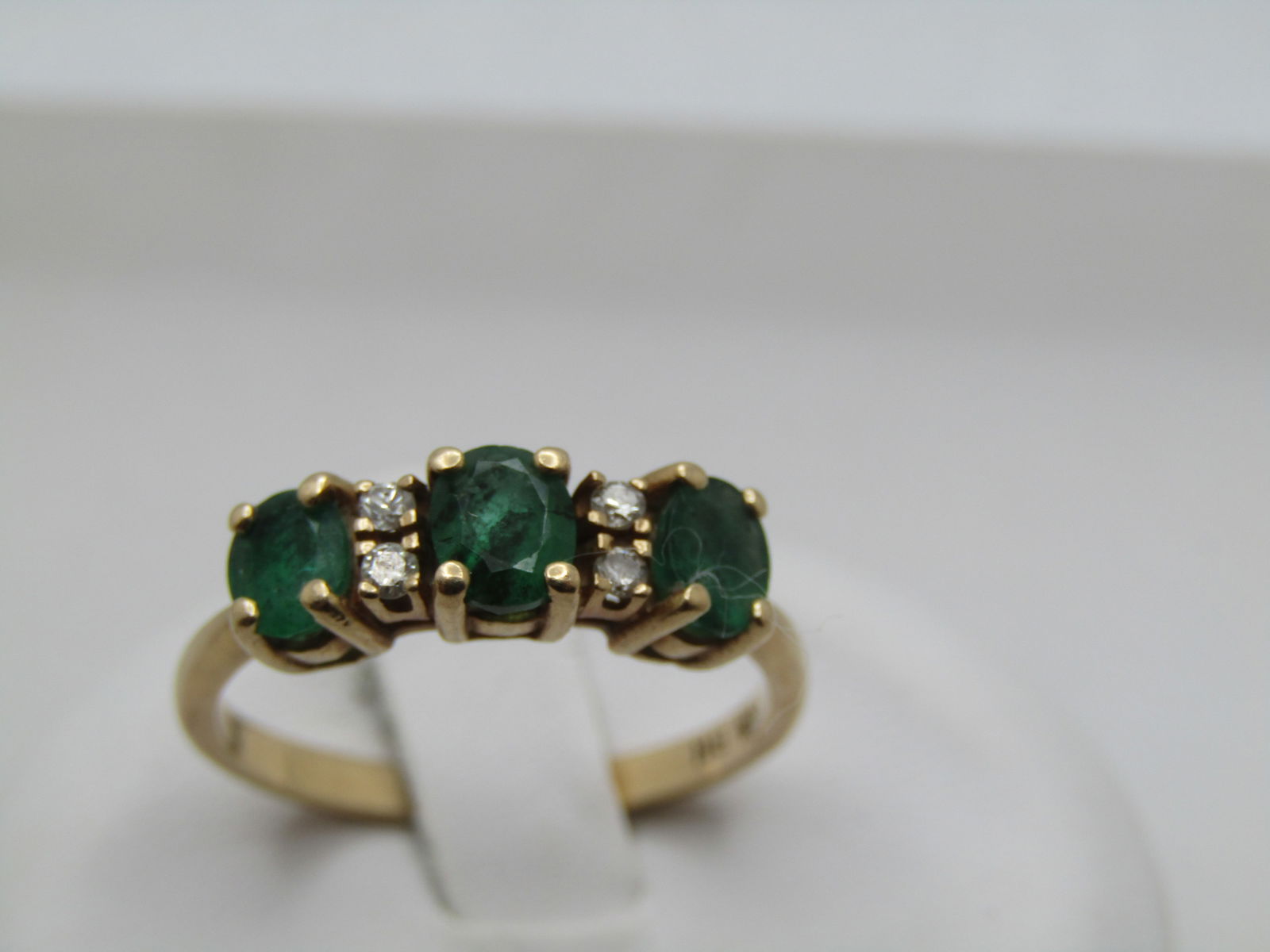Vintage 14kt Emerald & Diamond Ring, Sz. 6.5, Signed BH, 1960's-1970's: Title:Vintage 14kt Emerald & Diamond Ring, Sz. 6.5, Signed BH, 1960's-1970's Description:Vintage 14kt Emerald & Diamond Ring, Sz. 6.5, Signed BH, 1960's-1970's. This has three oval faceted natural eme