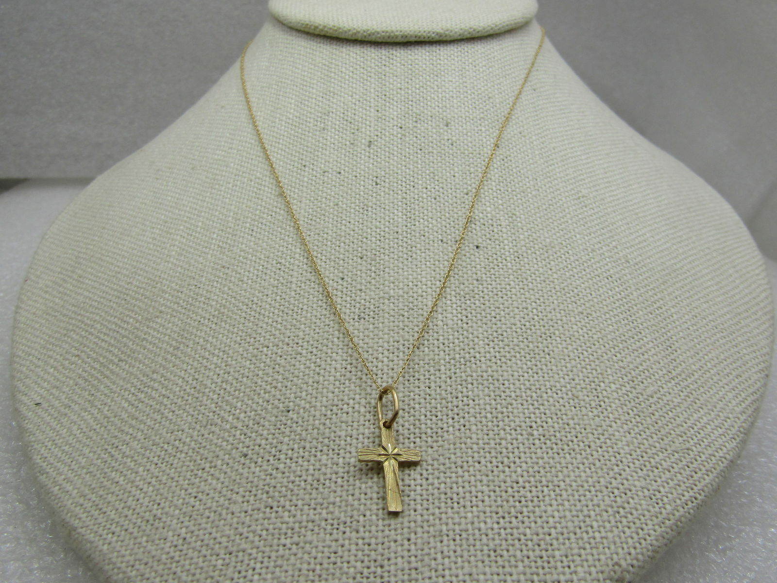 Vintage 14kt Gold Cross Necklace, 16", Signed: Title:Vintage 14kt Gold Cross Necklace, 16", SignedDescription:Vintage 14kt Gold Cross Necklace, 16", Signed with a C with a small diamond shape at the opening. The cross has diamond cut accents like