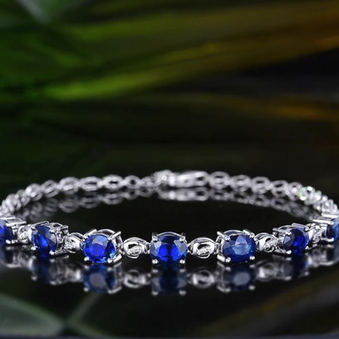 14K GOLD 3.65 CTW NATURAL SAPPHIRE & DIAMOND BRACELET: Title:14K GOLD 3.65 CTW NATURAL SAPPHIRE & DIAMOND BRACELETDescription:Ref:230528370Gold Content:14K GoldMain Gemstone:SapphireNumber of stones:7Shape:OvalCarat Weight:3.6ct