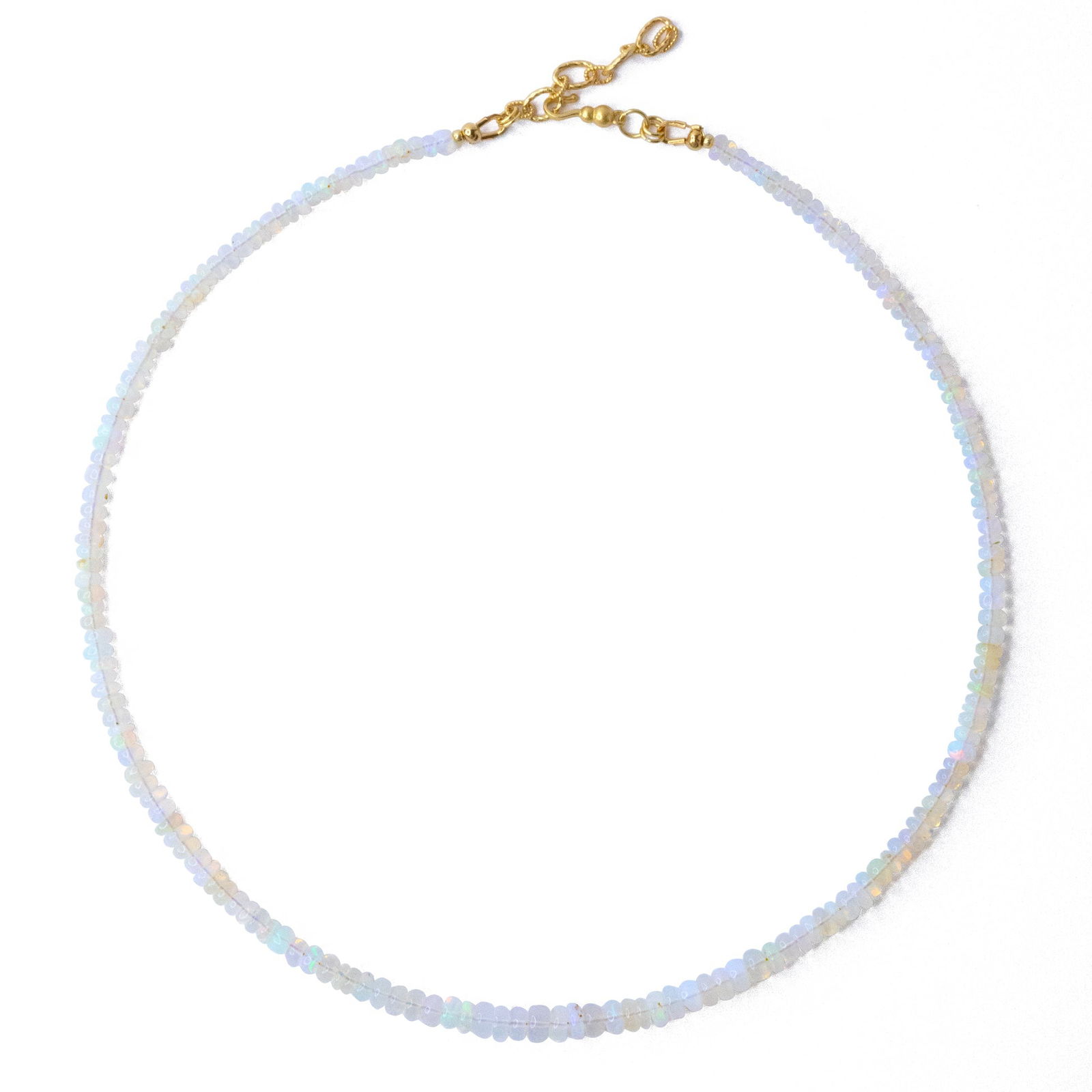 Ethiopian Opal Necklace: Title:Ethiopian Opal Necklace Description:This necklace, adorned with graduated Ethiopian Opals, empowers you to step into every room with confidence and grace. It whispers of elegance and individuali