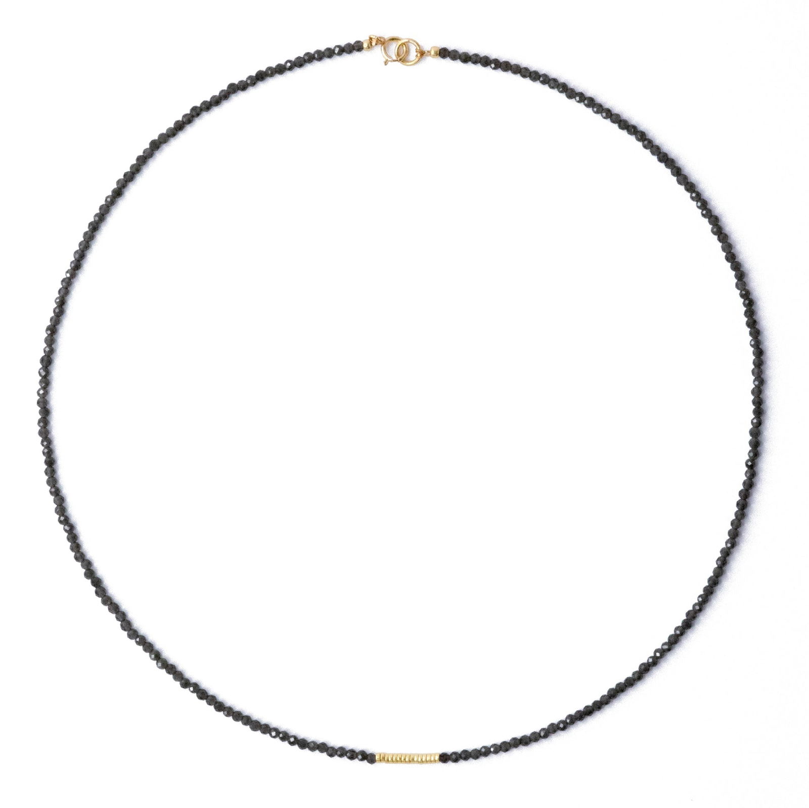 Tiny Charcoal Obsidian Necklace: Title:Tiny Charcoal Obsidian Necklace Description:The shiny grey Obsidian will infuse your style with a touch of refined mystique, making you feel effortlessly chic and confidently captivating. Elevat