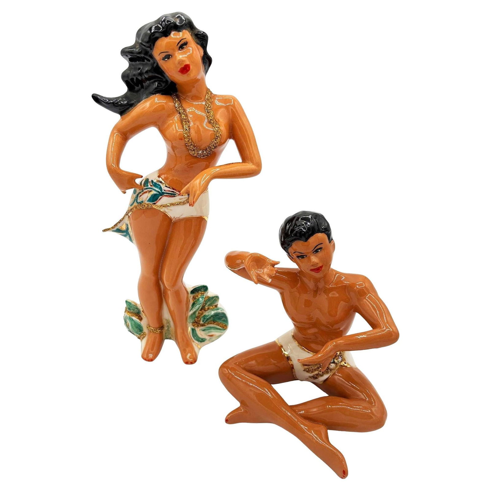 Rare 1956 Hawaiian Hula Girl & Native Male Ceramic Statue Pair by Bette: Title: Rare 1956 Hawaiian Hula Girl & Native Male Ceramic Statue Pair by Bette Description: Rare 1956 Mid-century Hawaiian hula girl & native male ceramic statue set. Each captures the charm of