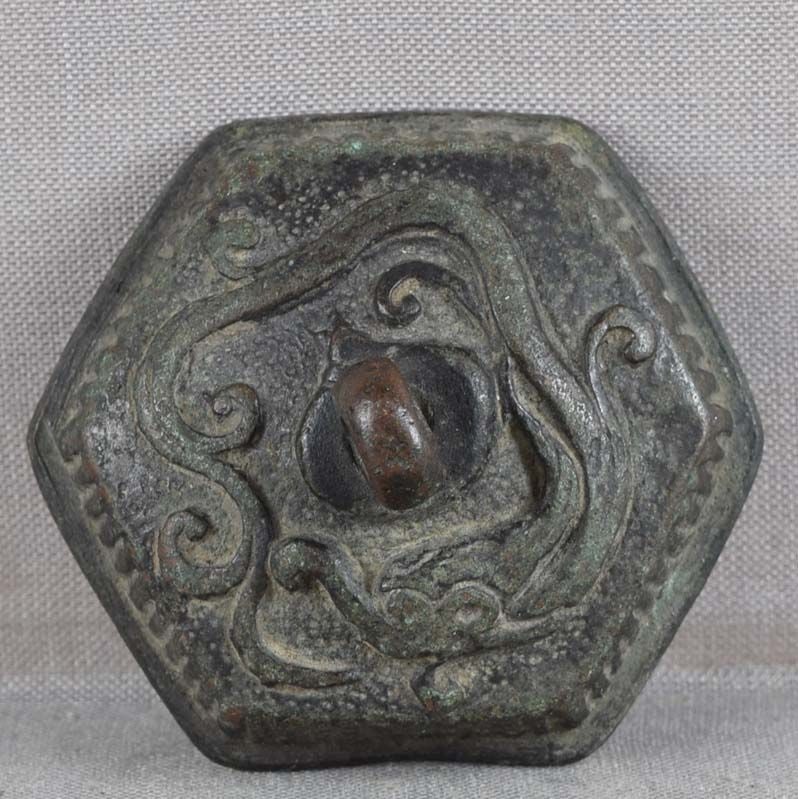 18c bronze SUIGARAAKE netsuke DRAGON & PEARL: Late 18th to early 19th century bronze suigaraake (ashtray) netsuke in a modified hexagonal drum shape, its outside cast with a sinuous water dragon chasing a Precious Gem. Very well designed piece, g