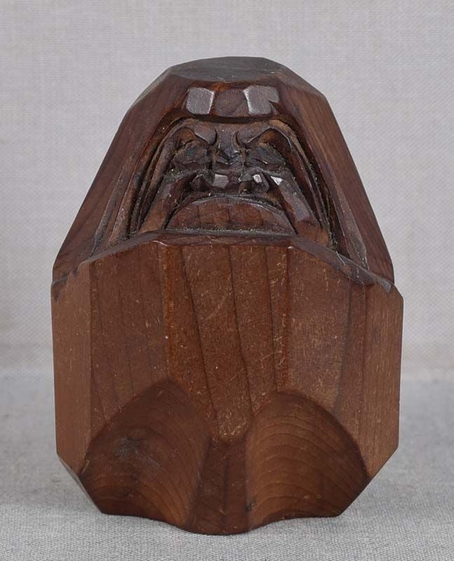 19c okimono DARUMA Hida netsuke school: Late Meiji period (1890s -1912) wooden okimono of cloth doll of Daruma (founder of Zen Buddhism) enveloped in his monastic robe. The subject represents Daruma coming back from deep trance in which he