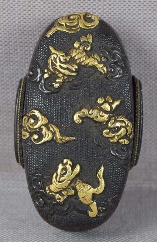19c Japanese sword kashira TIGER SHISHI KIRIN: 19th century Edo period Japanese bronze kashira (metal pommel at the end of the hilt of a sword) with multimetal inlays depicting wispy clouds supporting a tiger, a shishi and a kirin, all on a