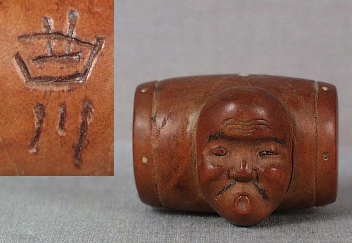 19c netsuke HYOTTOKO MASK on drum by KYOKUSEN (1 of 4)