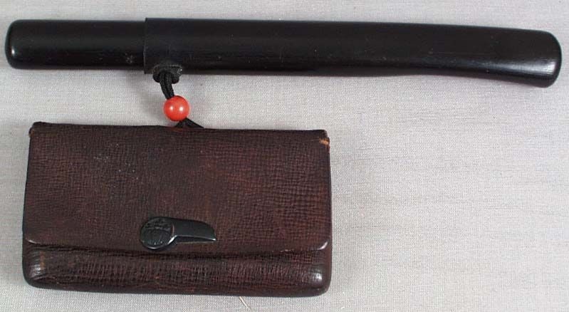 19c Japanese TOBACCO POUCH pipe holder Shogun TOYOTOMI crest: 19th century Japanese leather tobacco pouch with kiseruzutsu (tobacco pipe holder). Bronze kanemono - pouch clasp - is made in a shape of a roof tile bearing Shogun Toyotomi mon - the crest of the