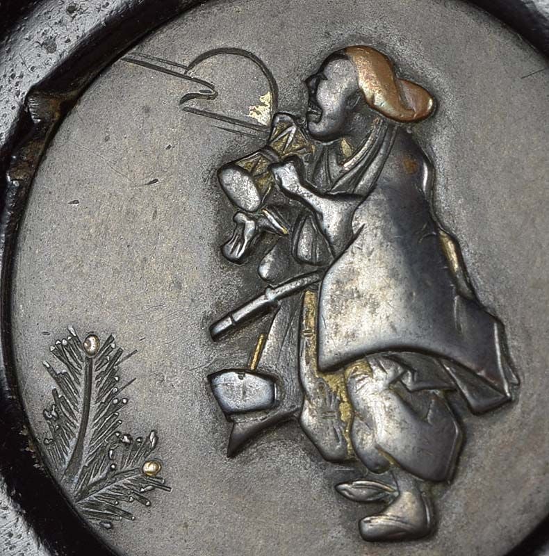 19c netsuke SAIZO DANCER: 19th century metal and wood kagamibuta (mirror lid) netsuke. Patinated bronze top with inlaid and carved design of a Saizo dancer playing tsuzumi (a hand drum) by a pine sapling and with the moon part