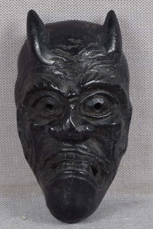 19c ebony netsuke DEMON HANNYA mask: 19th century kokutan (ebony) netsuke representing a theatrical mask of horned demon Hannya. Wonderful crisp detailing, beautiful lustrous patina from wear. Height 1 15/16 inches. Reserve: $225.00 Ship