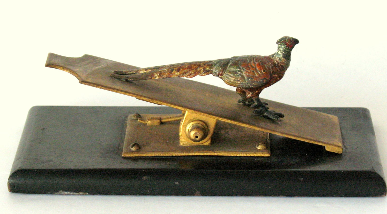 Antique cold painted bronze Pheasant paper clip.: Title: Antique cold painted bronze Pheasant paper clip.Date/Period: 1800'sDimension: 6 1/4” x 3” x 2”Additional Information: Nice antique cold paint bronze Pheasant paper clip in