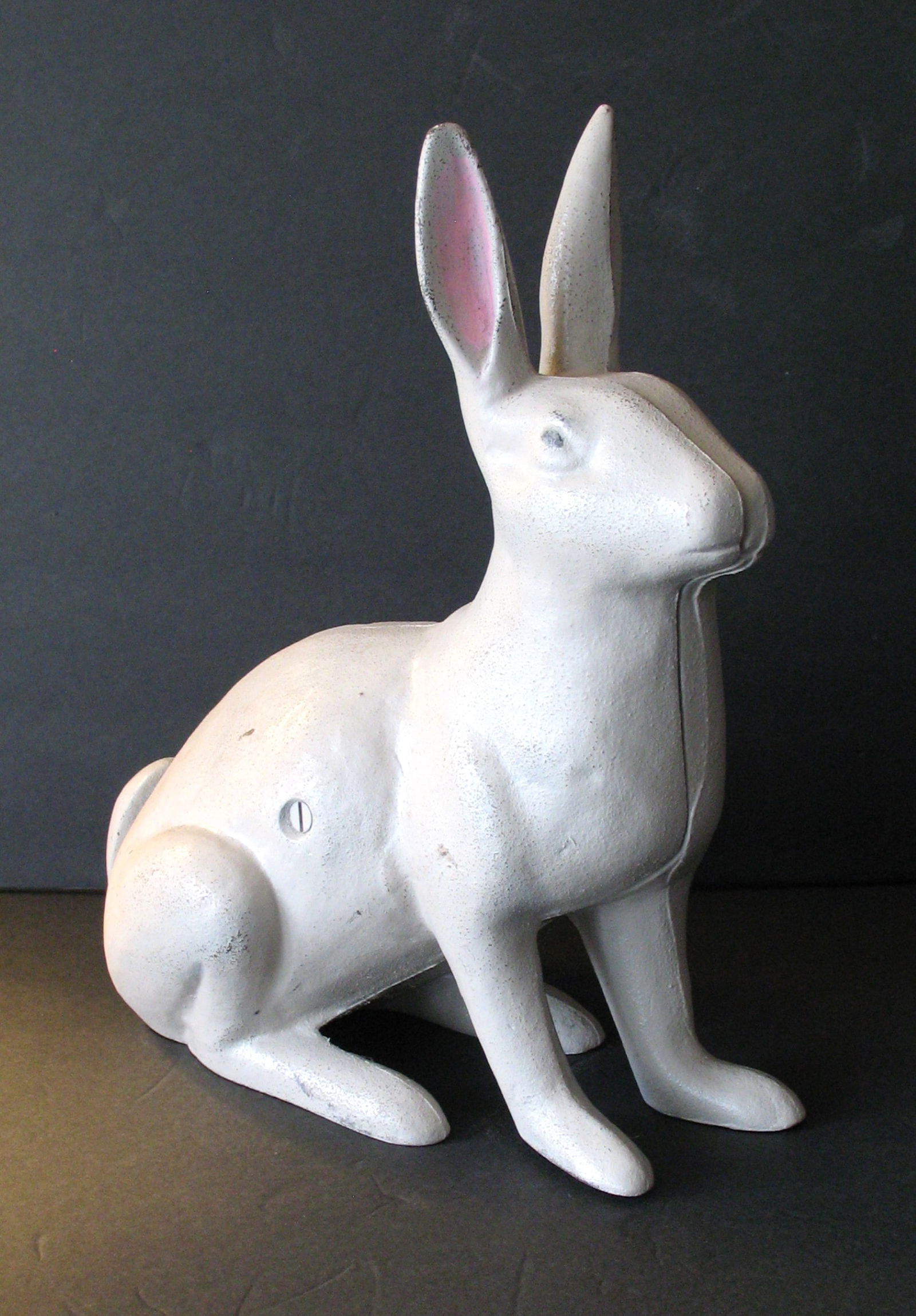 Antique cast iron rabbit door stop. - 2
