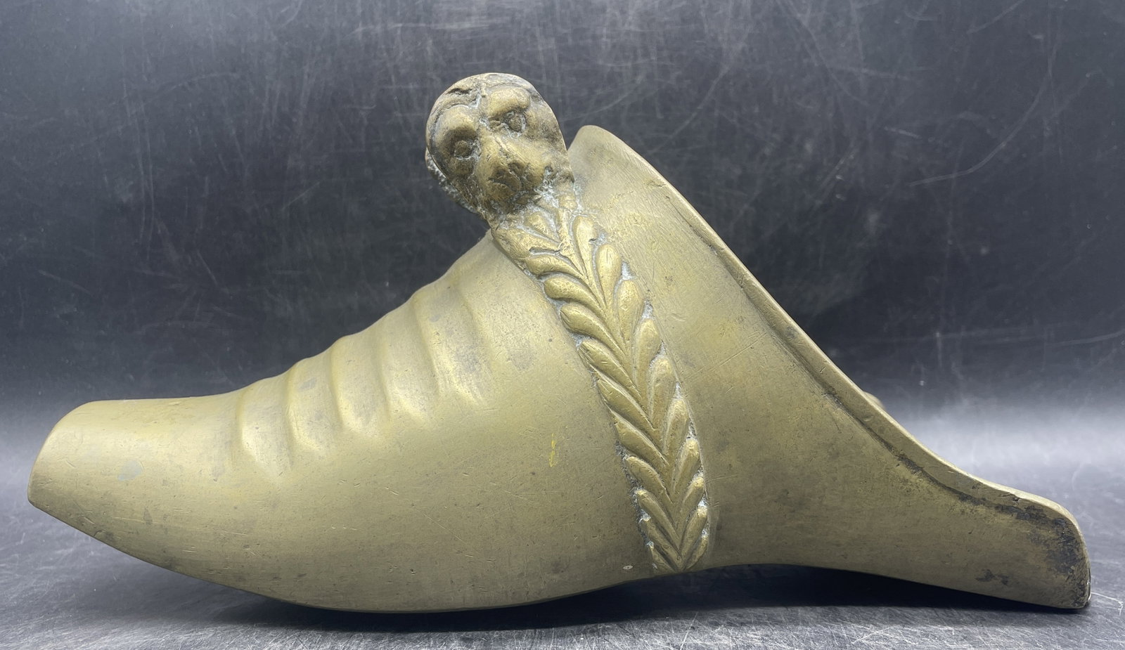 ANTIQUE SPANISH COLONIAL STIRRUP Lion Face Buckle: Date/Period: unknown Dimension: approx 5" tall x 10 x 4 Material: metal Additional Information: ANTIQUE SPANISH COLONIAL STIRRUP Lion Face Buckle Shipping: Domestic: Flat-rate of $15.00 to anywhere wi