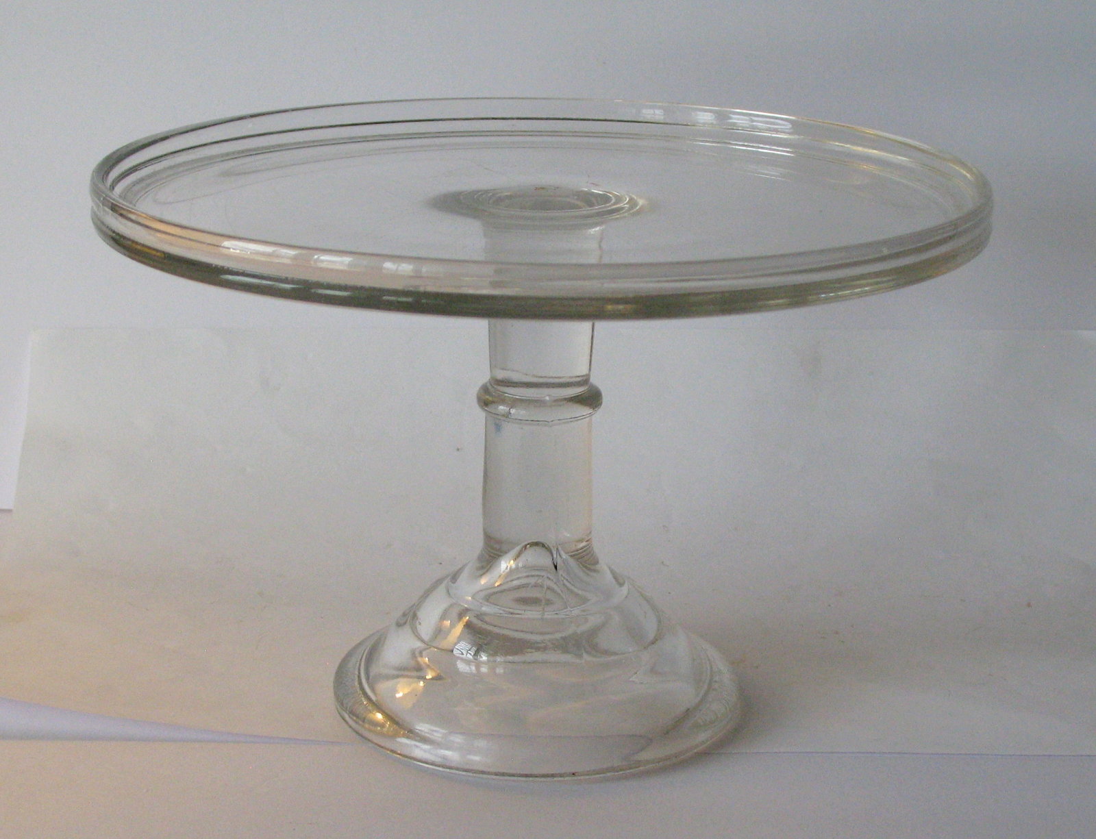 Antique clear glass cake pedestal stand. (1 of 5)
