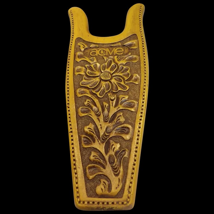 ACME Logo Faux Tooled Leather Boot Jack: This ACME Logo Faux Tooled Leather Boot Jack is in excellent condition. It does have some use marks at the base of jack (see photos). It measures 10 ¼” x 4 ¼” x 3 ¾”.