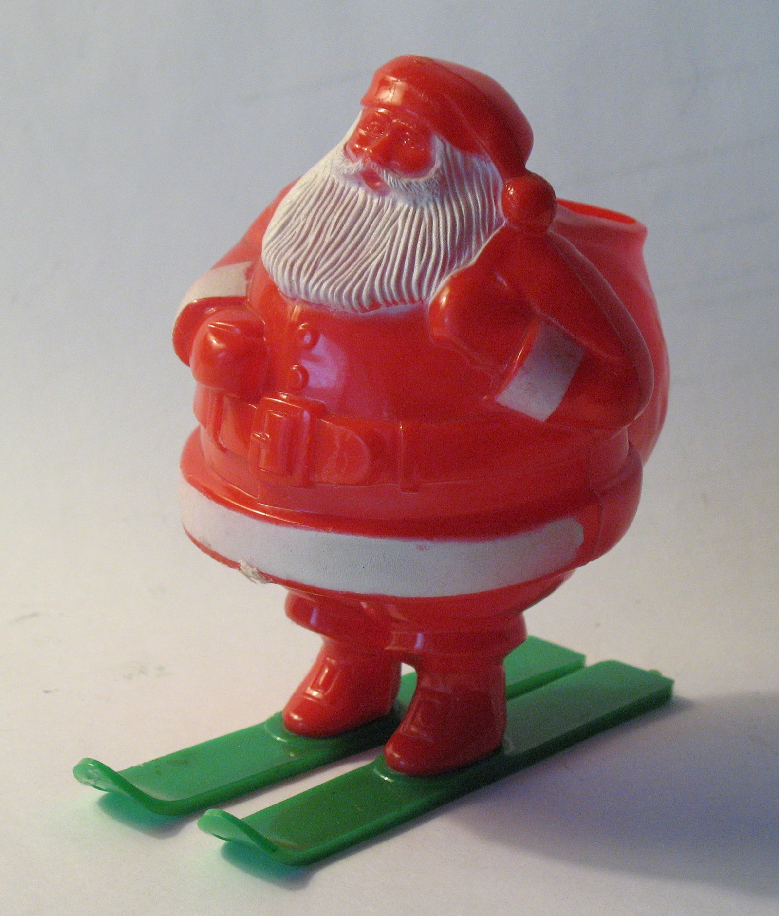 Vintage plastic Santa on skies candy container. (1 of 3)