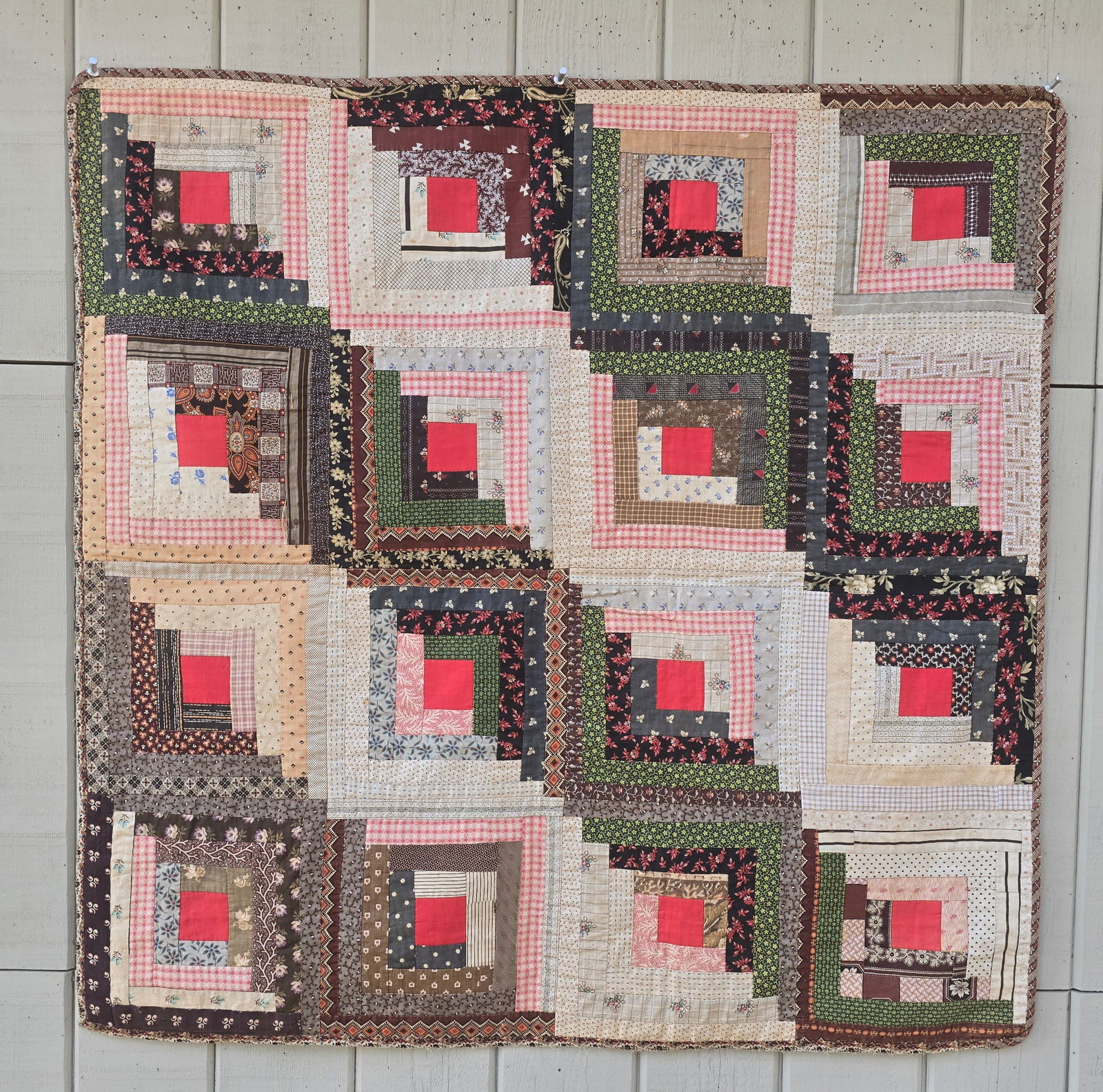 Log Cabin crib quilt: Title: Log Cabin crib quilt Dimension: 33 1/2" square Description: Lancaster Count, Pa pieced log cabin crib quilt ca 1890-1910. Straight furrows pattern. Good fabric mix. Wear to one binding edge. Th