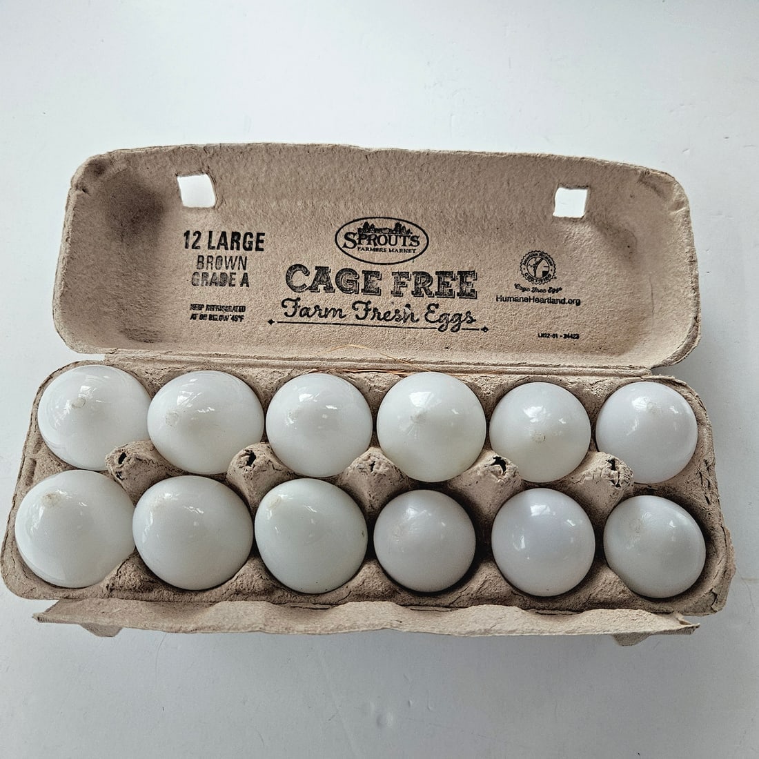 One Dozen White Glass Hand Blown Brooding Eggs - 8