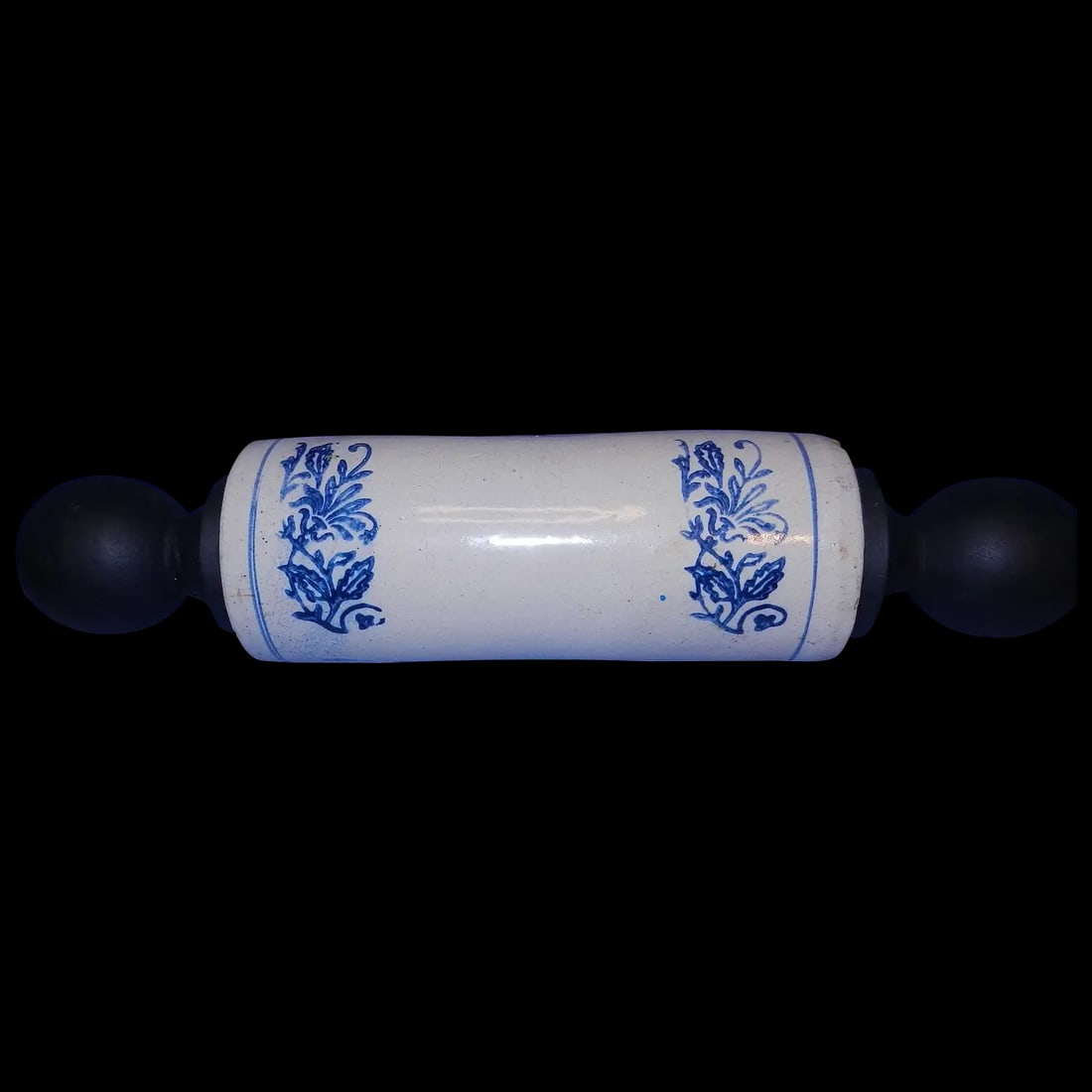 Antique Salt Glazed Blue & White Stoneware Rolling Pin early Nineteen Hundreds: This Antique Salt Glazed Blue & White Stoneware Rolling Pin early Nineteen Hundreds is in very good condition. It does have 2 chips and a slight crack but is structurally intact. The wood handles are