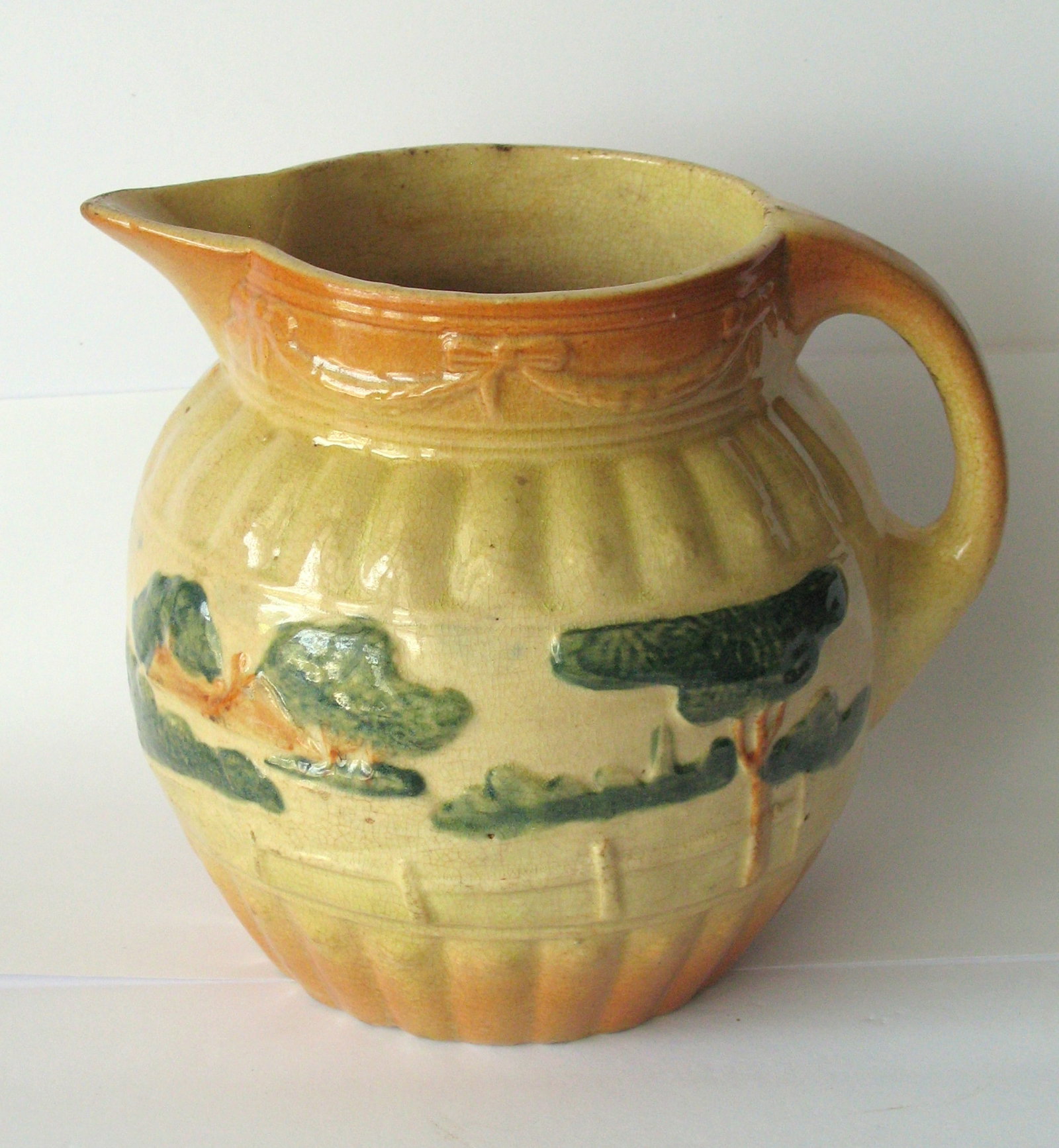 Antique yellow ware cream pitcher. (1 of 5)