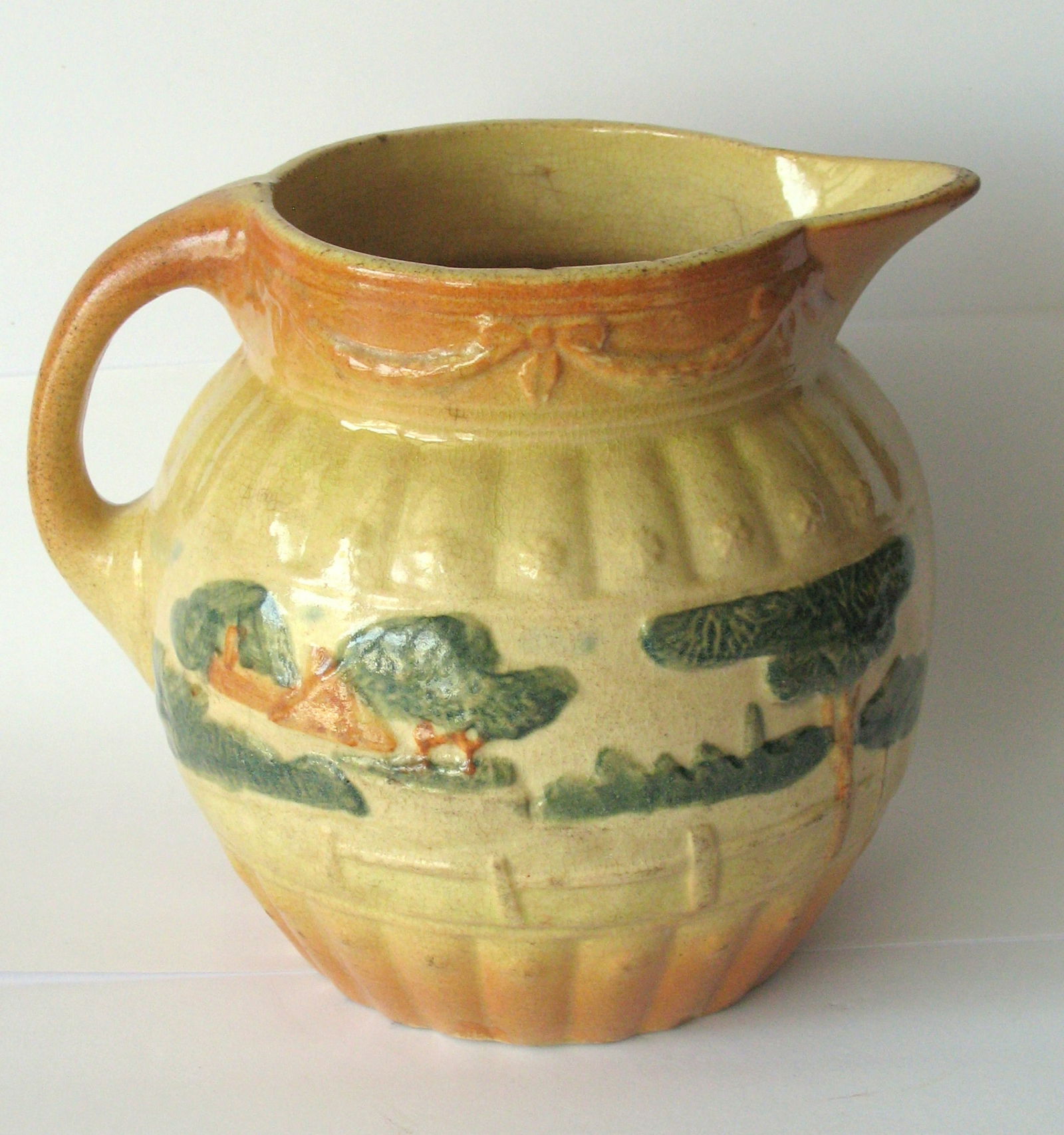 Antique yellow ware cream pitcher. - 2