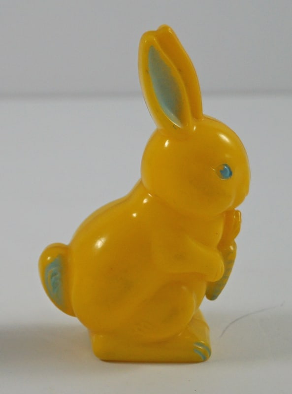 Easter Rabbit w/ Carrot Child’s Rattle #4: Title: Easter Rabbit w/ Carrot Child’s Rattle #4 Dimension: 3 3/4” tall x 2 1/8” wide. Date: Ca. 1950’s-60’s. Additional Information: Vintage sitting up Easter Rabbit wit