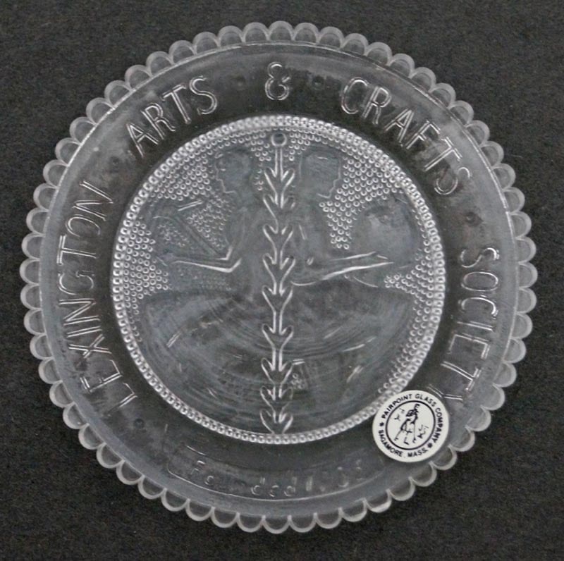 Arts & Craft Society Pairpoint Cup Plate: Title: Arts & Craft Society Pairpoint Cup PlateDimension: App. 3 1/2 " DiameterDate: ---Additional Information: Offering a Vintage Pairpoint Cup Plate, produced in 1981, Arts & Craft design, Clear