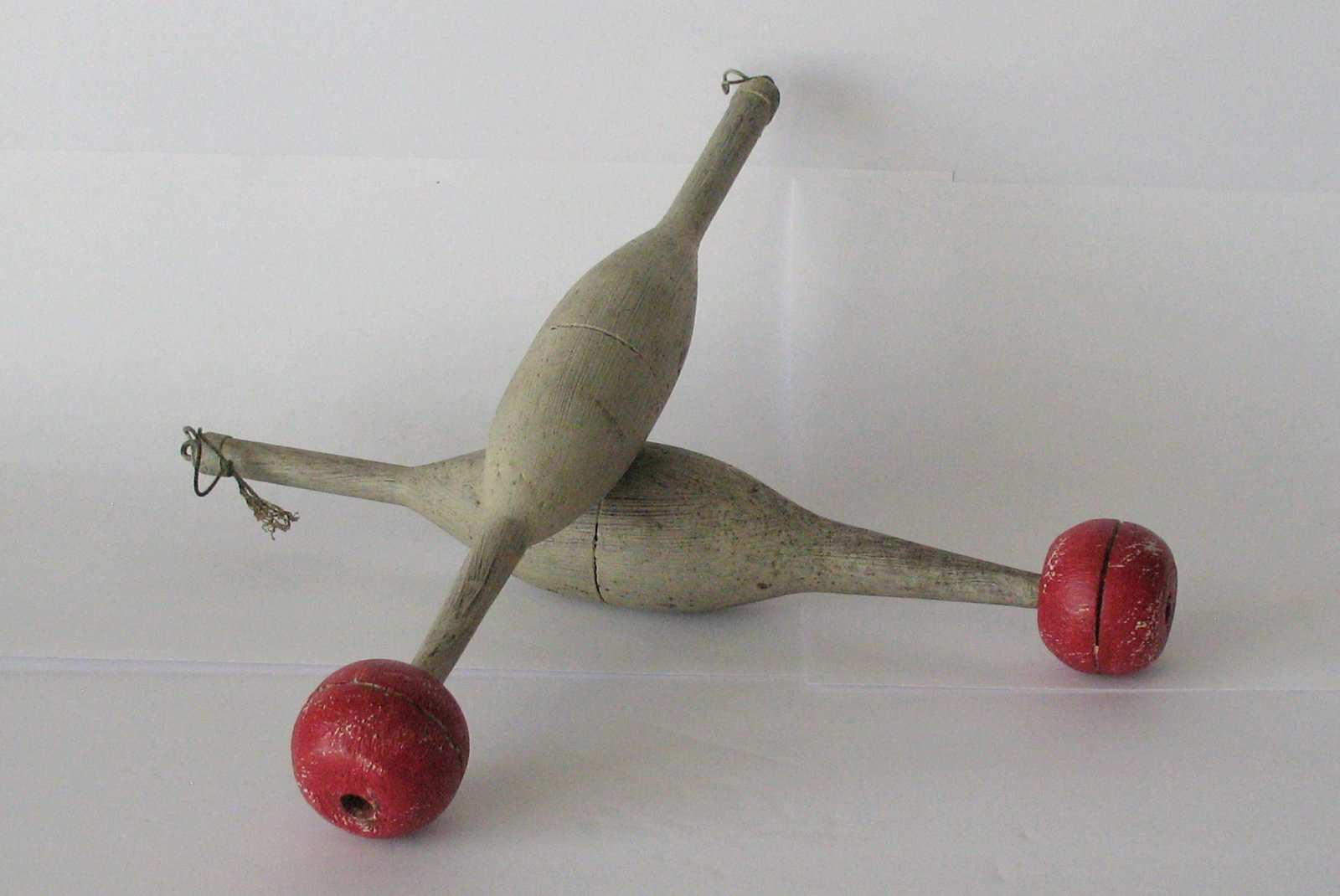Pair of antique folk art fishing bobbers. (1 of 4)