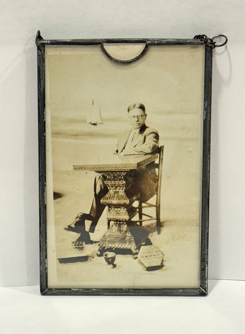 RPPC Real Photo Postcard Sidna Allen Folk Art Made in Prison Glass Case 1930s: Real photo studio postcard of Sidna Allen who made objects out of scrounged materials while serving time for murder inside prison. His masterpiece was the table pictured in the postcard. It states'