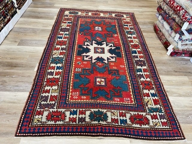Antique Kazak Lesghi Caucasin Rug-2517: Title:Antique Kazak Lesghi Caucasin Rug-2517 Description:Beautiful antique Kazak Caucasian rug with three star design on red field., size 4 ft. 10 inches by 8 ft, , circa late 19th century, excellent