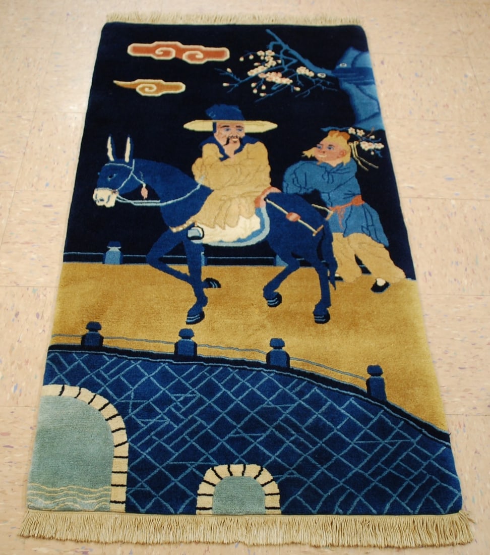 c1950s ANTIQUE PICTURAL CHINESE RUG OF MAN RIDING THE DONKY,SIZE OF 2'7" X 5'1": Title:c1950s ANTIQUE PICTURAL CHINESE RUG OF MAN RIDING THE DONKY,SIZE OF 2'7" X 5'1"Description:This is a vintage Chinese area rug from the 1950s featuring a pictorial design of a man riding a