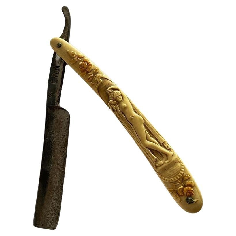 Rare Figure Art Nouveau Celluloid Straight Razor by Ern. C. Friedr: Title: Rare Figure Art Nouveau Celluloid Straight Razor by Ern. C. Friedr Description: Rare Figure Art Nouveau celluloid handle Straight Razor. This is a great antique straight razor with a detailed