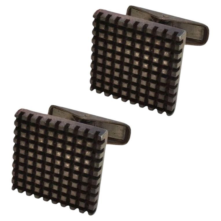 Allan Adler Sterling Silver Modernist Cufflinks, circa 1963: Title: Allan Adler Sterling Silver Modernist Cufflinks, circa 1963 Description: Early Allan Adler cuff links, marked "Allan Adler" and "Sterling" featuring a modernist grid pattern fixed to a