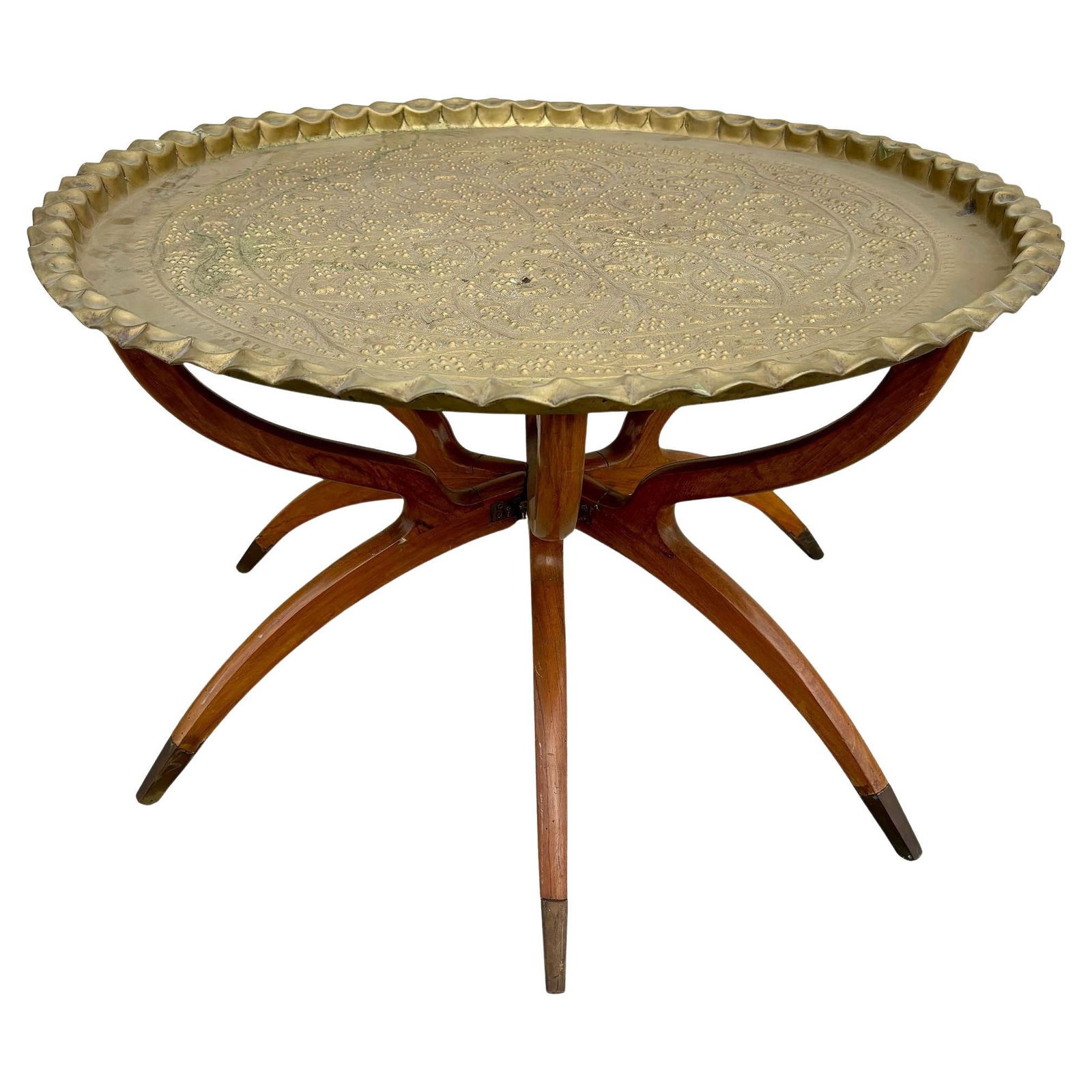 Mid-century Moroccan Moorish Tray Coffee Table: Title: Mid-century Moroccan Moorish Tray Coffee Table Description: Original hand-hammered brass Moroccan tray with a 6-leg folding Mide-century arched mahogany base, a seamless blend of the bohemian