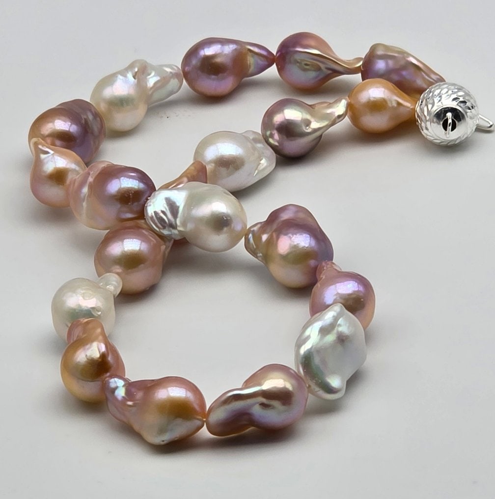 Necklace featuring imposingly sized nucleated baroque (Edison) pearls. This piece celebrates the - 4