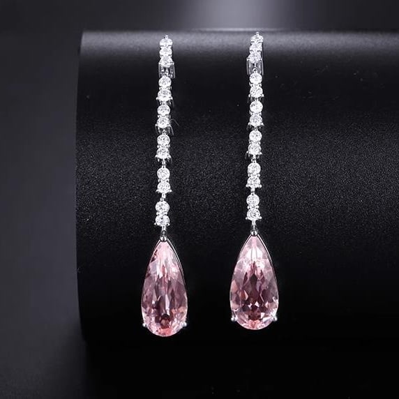 14K GOLD 3.70 CTW NATURAL MORGANITE & DIAMOND EARRINGS: Title:14K GOLD 3.70 CTW NATURAL MORGANITE & DIAMOND EARRINGSDescription:Ref:230528387Gold Content:14K GoldMain Gemstone:MorganiteNumber of stones:2Shape:PearCarat Weight:3.27ct