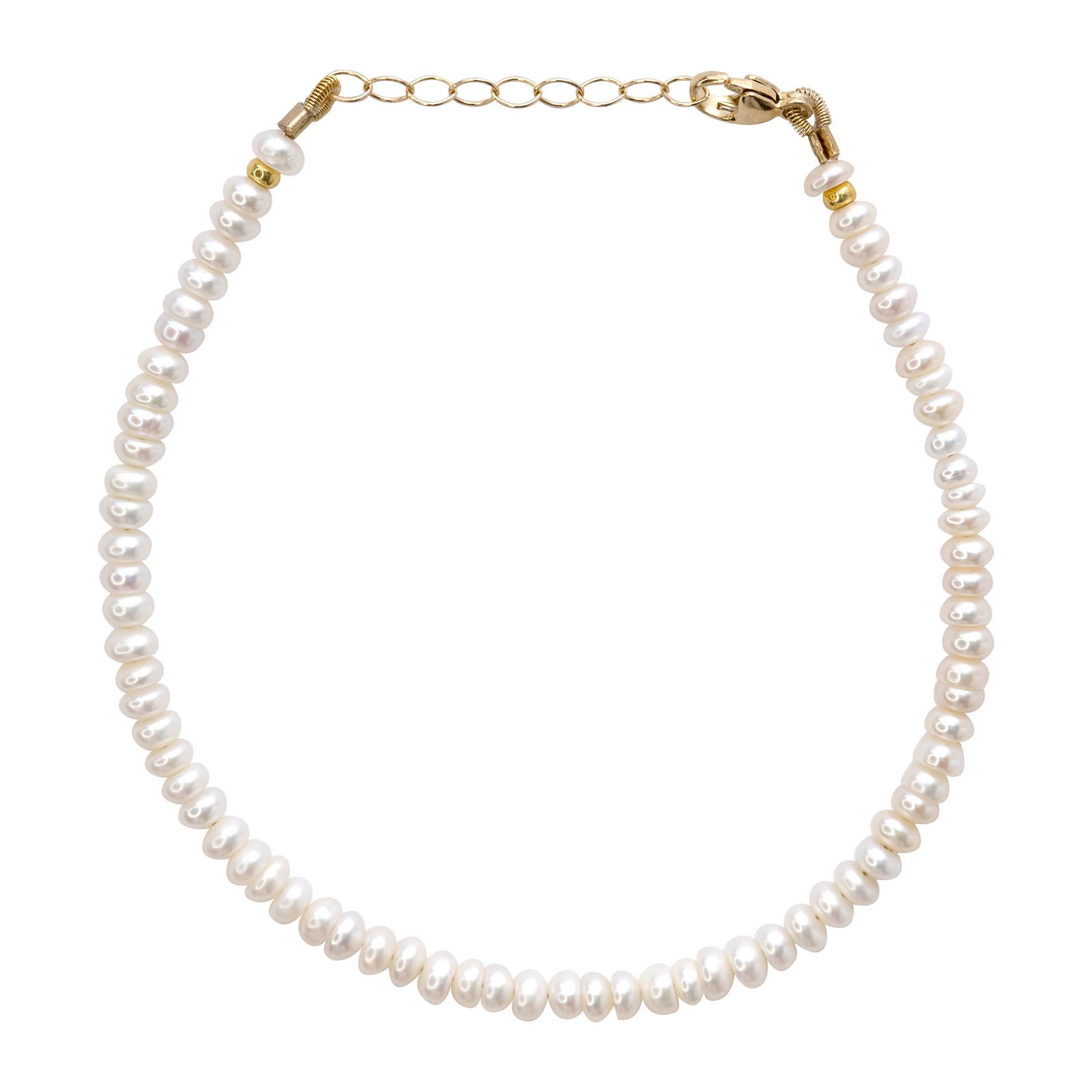 Mini Pearl Bracelet 14K Gold: Title:Mini Pearl Bracelet 14K GoldDescription:Like wearing moonlight against your skin, this luminous pearl bracelet captures the quiet elegance of timeless beauty with each perfectly imperfect gem.