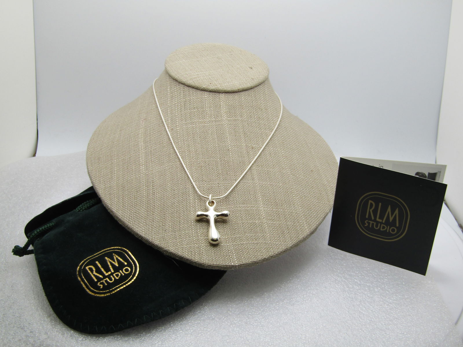 Sterling Silver Modern Cross Neckace, 18", RLM, Oriignal Box and Clasp: Title:Sterling Silver Modern Cross Neckace, 18", RLM, Oriignal Box and ClaspDescription:Sterling Silver Modern Cross Neckace, 18", RLM, Oriignal Box and Clasp - Robert Lee Morris sterling snake chain