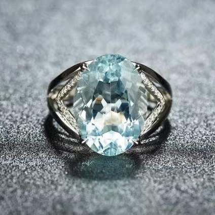 14K GOLD 7 CT NATURAL AQUAMARINE & DIAMOND RING: Title:14K GOLD 7 CT NATURAL AQUAMARINE & DIAMOND RING Description:Ref:230528390Gold Content:14K GoldRing Size:7.25USMain Gemstone:AquamarineNumber of stones:1Shape:OvalCarat Weight:7ct Color:BlueTreat