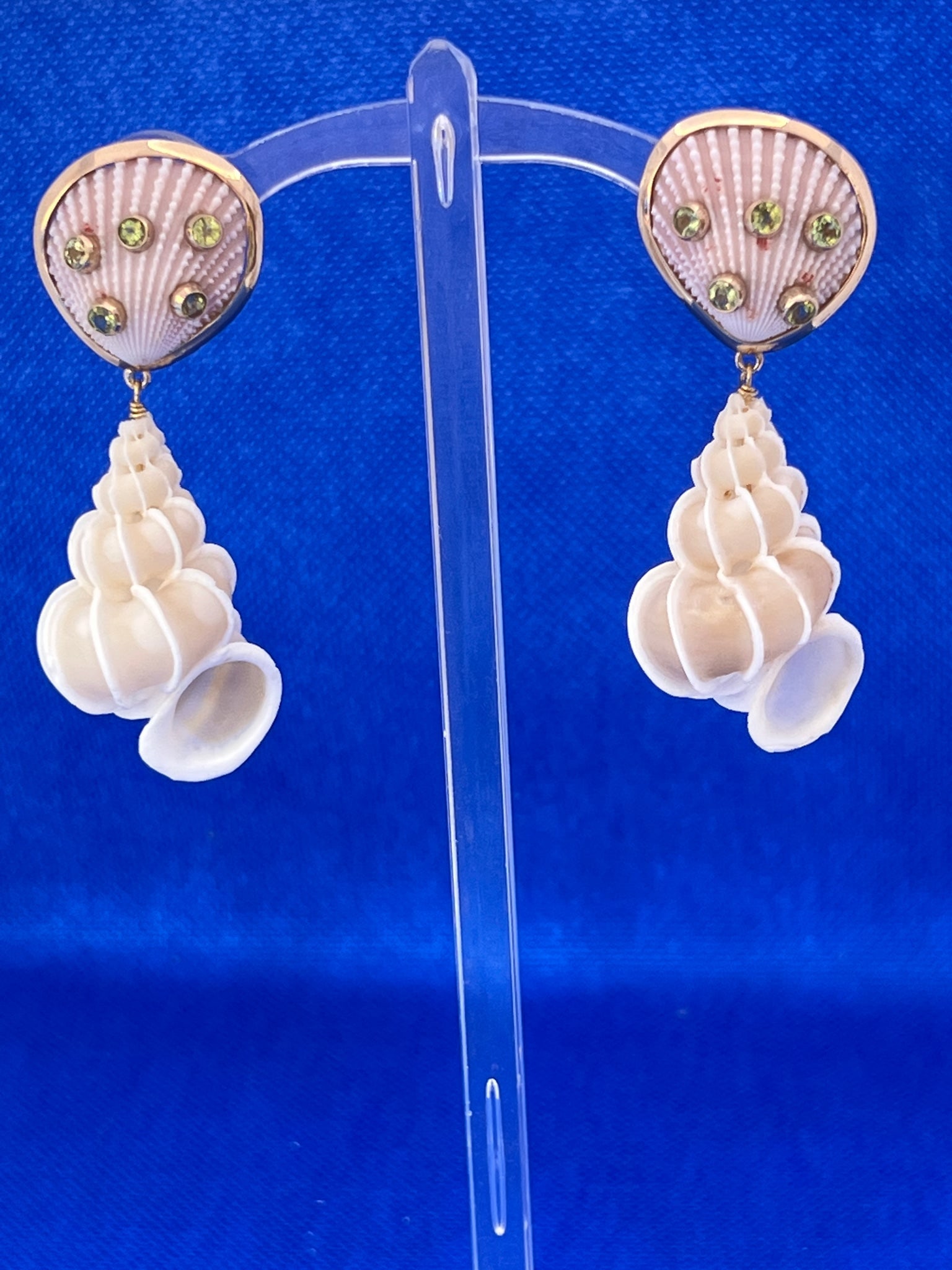 14kt. Wentletrap and Scallop Shell Drop Earrings: Title:14kt. Wentletrap and Scallop Shell Drop Earrings Description:Lovely Specimen Wentletrap Shells and Scallop 14kt. Drop Earrings with (5) Round Peridot Stones on each Scallop Shell - Pierced Post