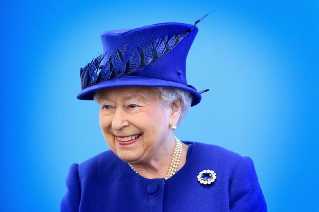 Her Royal Majesty The Queen Elizabeth II In Blue - signed limited edition: 2016 (printed later): Title: Her Royal Majesty The Queen Elizabeth II In Blue - signed limited edition: 2016 (printed later) Description: Queen Elizabeth II smiles as she meets people being helped by the Prince’s