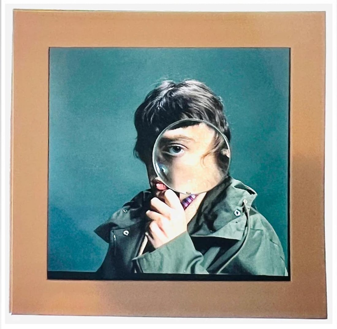 Mick Jagger with Magnifying Glass: 1970 (printed later) (1 of 2)