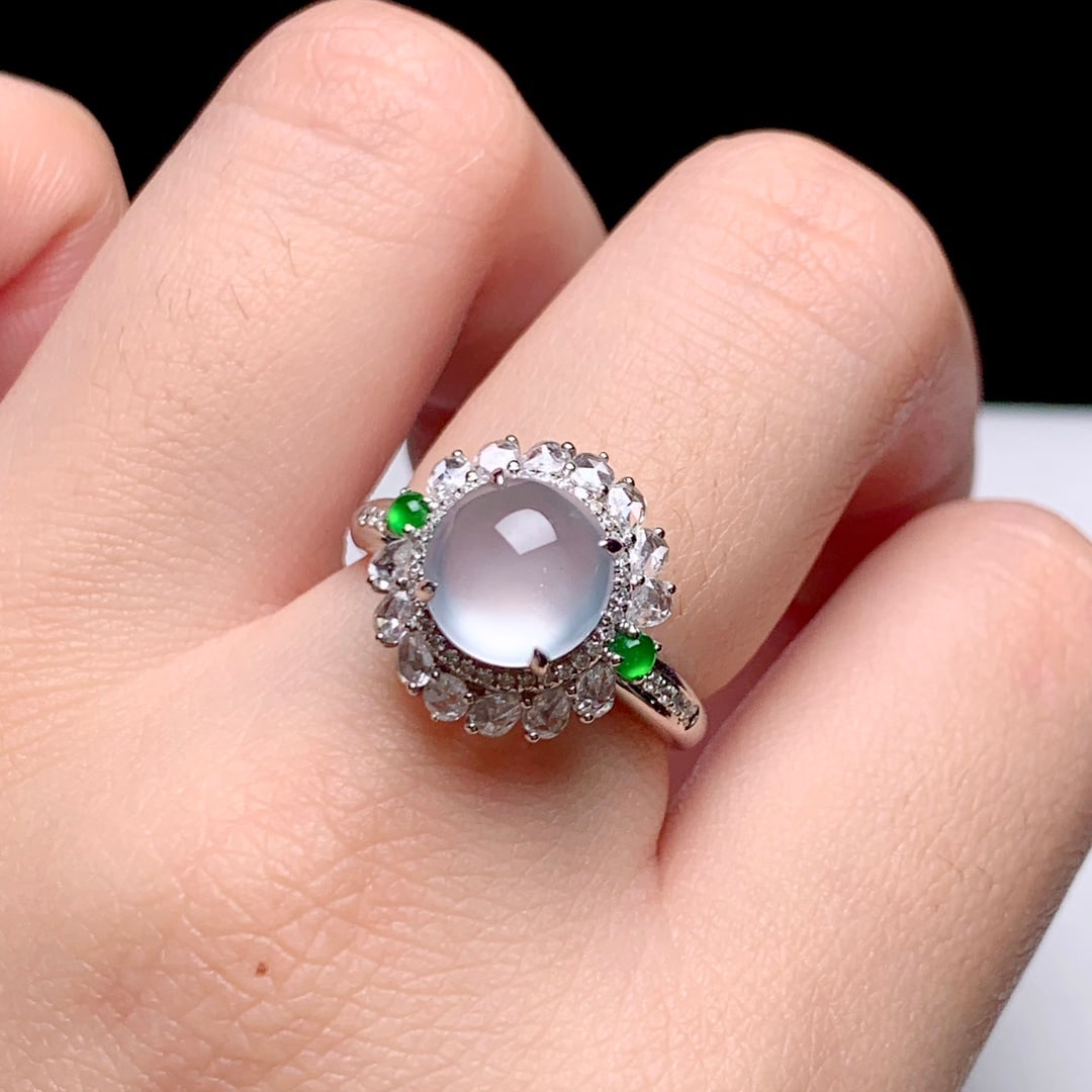 18k gold diamond-set high-ice egg-faced jadeite ring: Title: 18k gold diamond-set high-ice egg-faced jadeite ring Description: 18k gold diamond-set high-ice egg-faced jade ring, overall: 14.5x14x11.6mmBare stone: 8.5x8.2mmRing size: 14 Reserve: