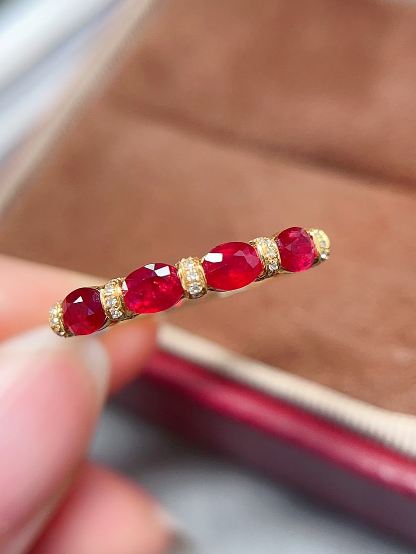 18K Gold Natural Ruby Ring: Title: 18K Gold Natural Ruby Ring Description: This ring showcases a stunning pigeon blood red hue, emitting a charming radiance. The simple band is crafted from luxurious 18K gold, perfectly compleme