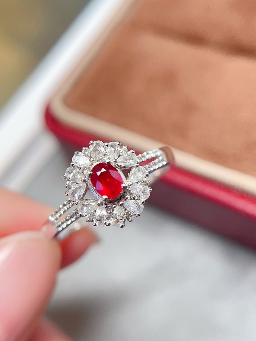 18k gold ruby ring: Title: 18k gold ruby ring Description: This ring showcases the fiery charm of natural rubies, set in lustrous 18k gold. Perfect for those who appreciate classic beauty, this piece is adorned with 46 w