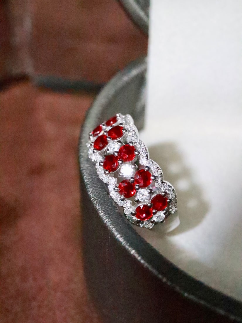 18K Natural Ruby Ring: Title: 18K Natural Ruby Ring Description: This ring is like a charming crown, wearing it on your finger exudes elegance. The 18K gold ring setting embraces a natural untreated ruby, its fiery red
