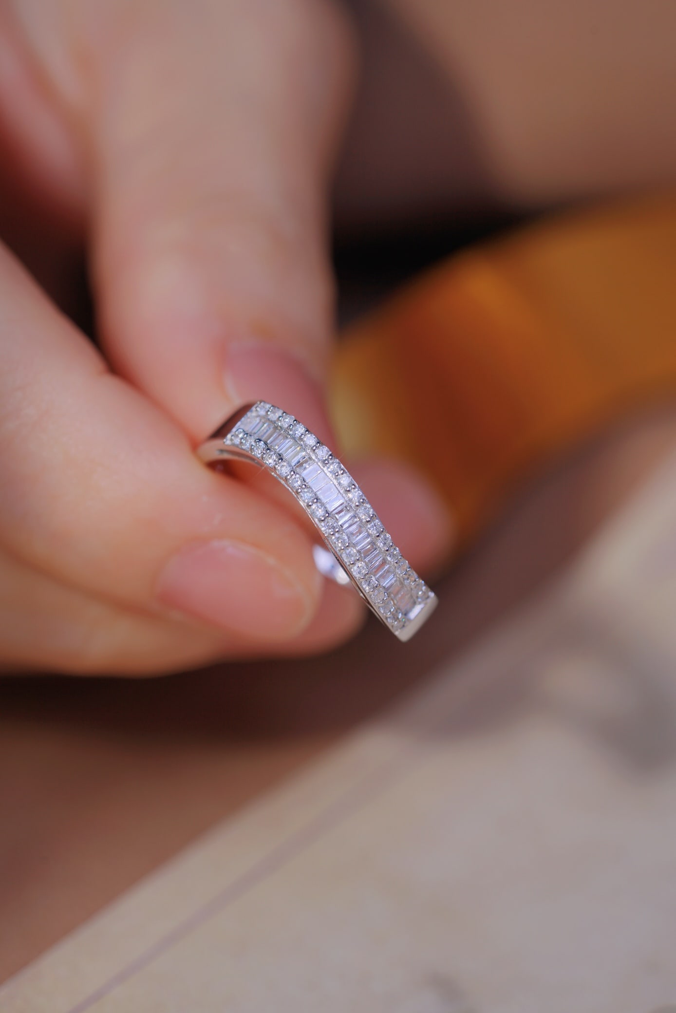 Platinum 900 natural diamond ring: Title: Platinum 900 natural diamond ring Description: This elegant ring features a 0.45ct diamond, presenting a charming wave shape. The unique design exudes a sense of flow and elegance, making it