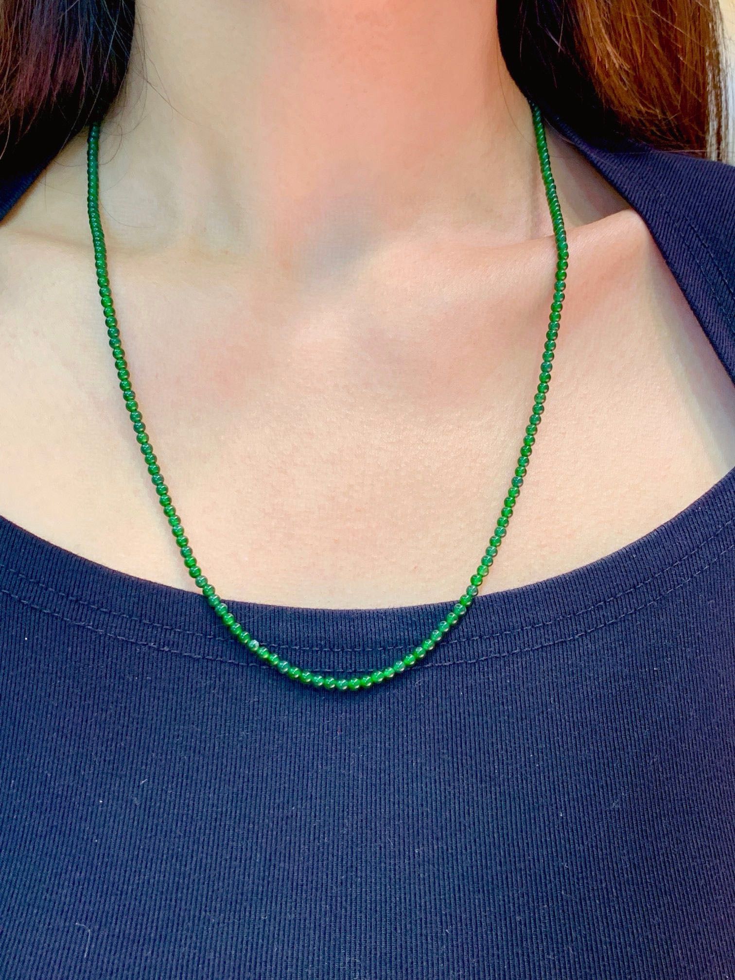 Jade bead necklace, bracelet, and anklet.: Title: Jade bead necklace, bracelet, and anklet. Description: Jade bead necklace, around 3m in length, with a 925 sterling silver clasp. It can be worn as both a necklace and a bracelet, with a total