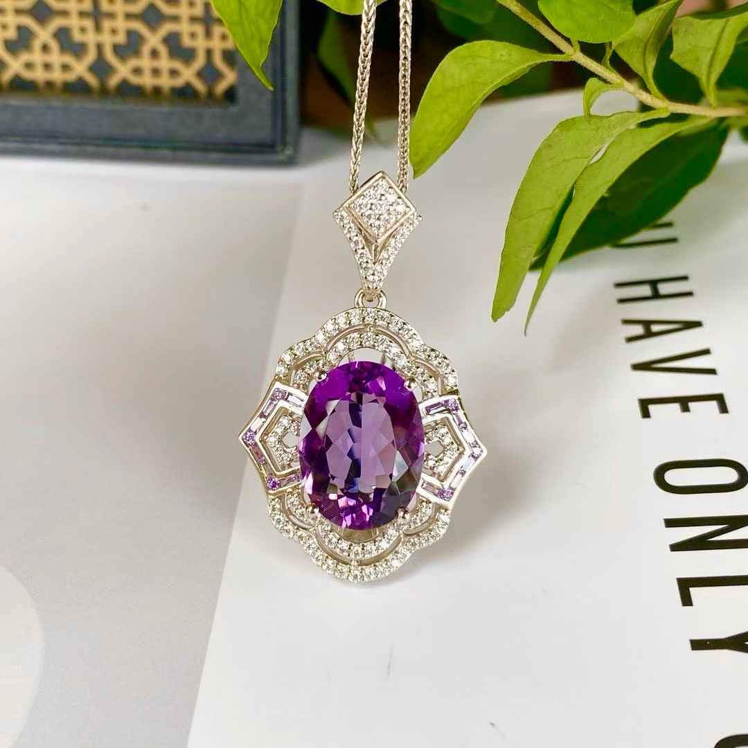 925 silver inlaid with amethyst pendant: Title: 925 silver inlaid with amethyst pendant Description: 925 silver inlaid with amethyst pendantMain stone 12x16mm Reserve: $400.00 Shipping:Domestic: Shipping rates are determined by