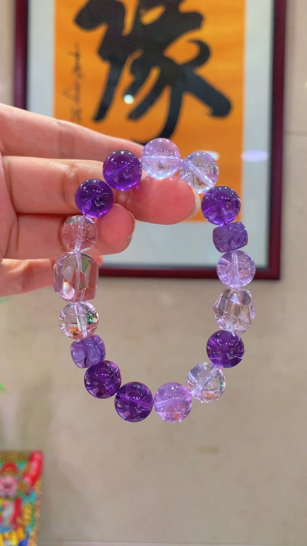 Natural Amethyst Bracelet: Title: Natural Amethyst Bracelet Description: This bracelet showcases the elegance of natural amethyst to the fullest. The faceted amethyst reflects a solid purple radiance, with rich and vibrant